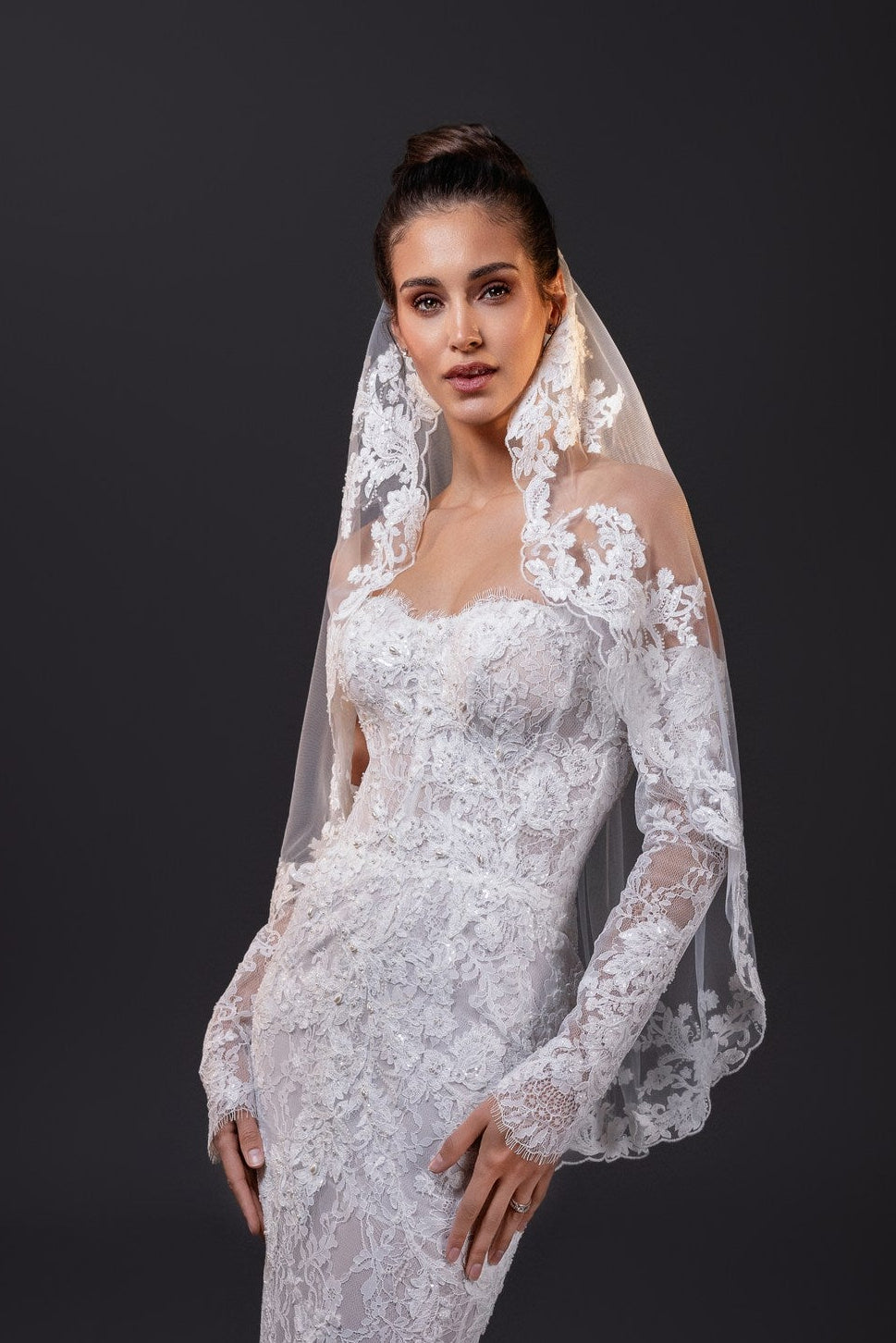 Francesca lace appliqué fingertip bridal veil with scalloped edges, styled with the Francesca gown in Toronto.