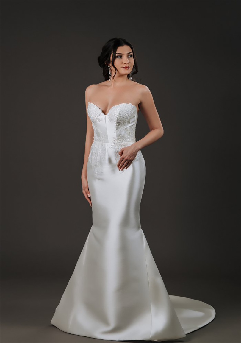 Helen strapless Mikado mermaid wedding gown with sculpted neckline and lace appliqué bodice.