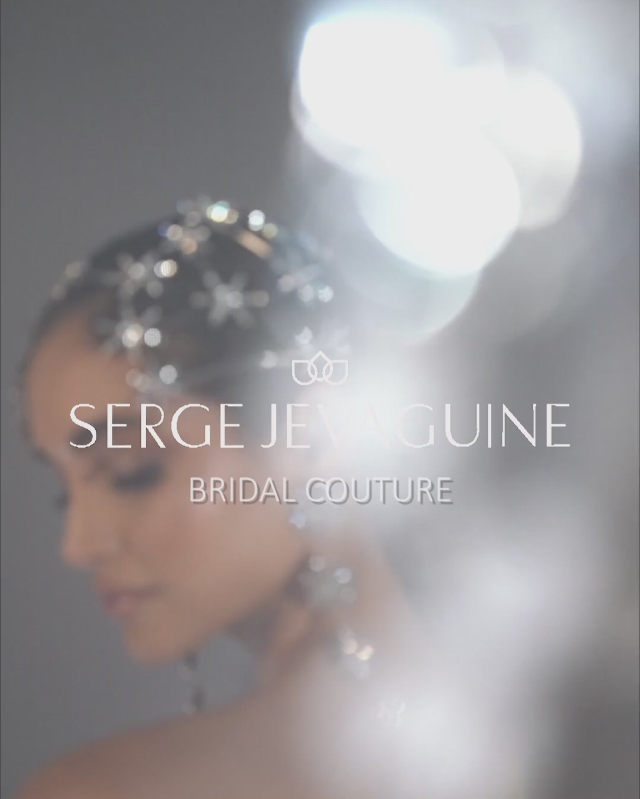 Nova off-the-shoulder lace ball gown wedding dress with corset bodice and deep V neckline in Toronto.